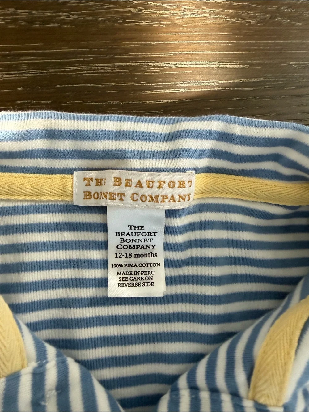 The Beaufort Bonnet Company Blue & White Striped Polo Romper with Yellow Trim
